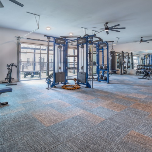 24 hour fitness center at apartments in Burleson TX with modern equipment
